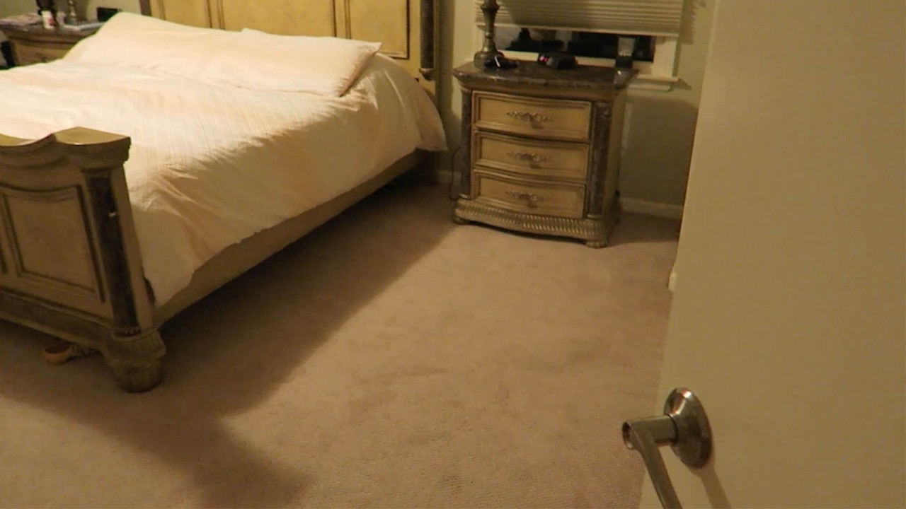 screenshot of door opening to a bedroom